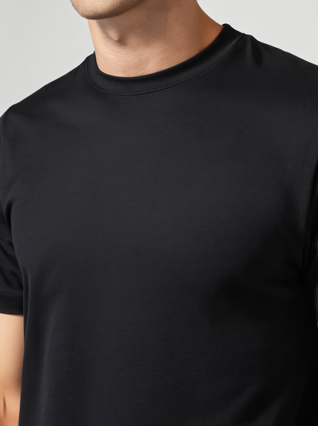 Closeup van gemerceriseerd katoen met subtiele glans, RARE SOCIETY Signature Tee